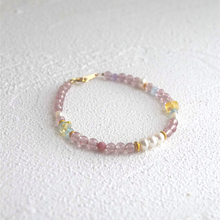 Load image into Gallery viewer, Multicolored crystal bracelet on a textured white surface