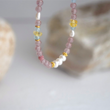 Load image into Gallery viewer, Beaded bracelet with pink &amp; yellow crystals, and white pearls on a neutral background
